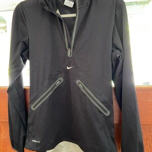 Nike storm fit running hoodie with reflective features.